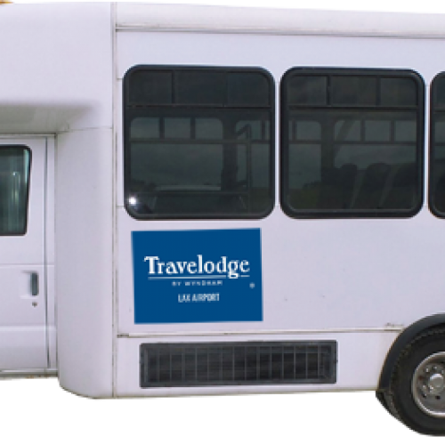 Image of a white shuttle bus featuring a blue 